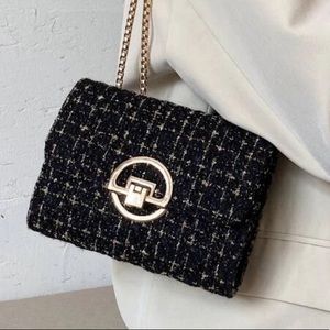 Textured tweed chain purse. Looks like a designer bag. Only worn once